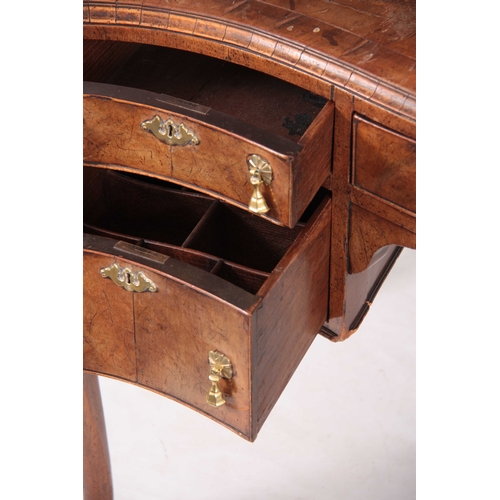 1025 - A 19TH CENTURY QUEEN ANNE STYLE FIGURED WALNUT SERPENTINE FRONTED DESK with a short-grained moulded ... 