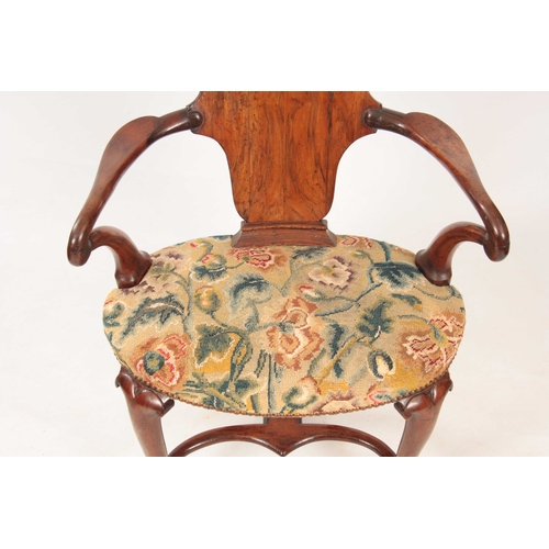 1033 - A GEORGE I WALNUT OPEN ARMCHAIR with solid vase-shaped splat back and shaped scrolled top rail, shep... 