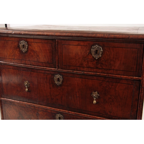 1034 - A WILLIAM AND MARY FIGURED WALNUT CHEST OF DRAWERS with quarter veneered top above two small and two... 