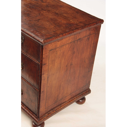 1034 - A WILLIAM AND MARY FIGURED WALNUT CHEST OF DRAWERS with quarter veneered top above two small and two... 