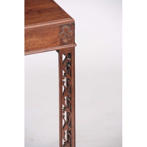 1044 - A GEORGE III FIGURED MAHOGANY CHIPPENDALE STYLE SILVER TABLE with caddy edge top above a shallow fri... 