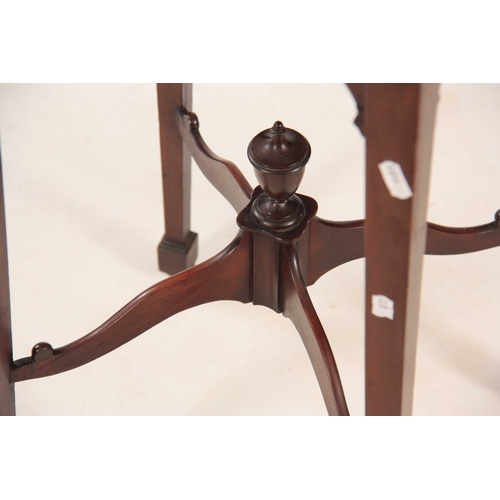 1045 - A GEORGE III FIGURED MAHOGANY KETTLESTAND the square top with chequer banded moulded edge above a pu... 