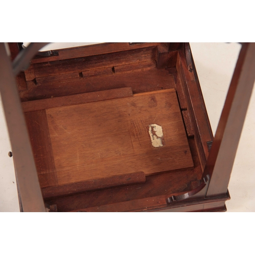 1045 - A GEORGE III FIGURED MAHOGANY KETTLESTAND the square top with chequer banded moulded edge above a pu... 