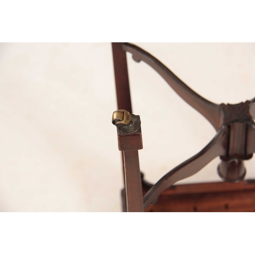 1045 - A GEORGE III FIGURED MAHOGANY KETTLESTAND the square top with chequer banded moulded edge above a pu... 