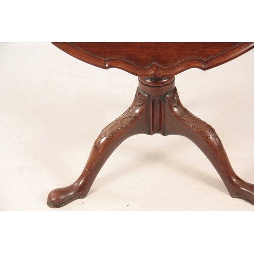 1048 - A MID 18TH CENTURY SCOTTISH FIGURED MAHOGANY TILT TOP TABLE with one-piece moulded pie crust top, ab... 