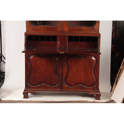 1049 - A GEORGE II MAHOGANY SECRETAIRE BOOKCASE IN THE MANER OF GILES GRENDEY having a moulded outset corni... 