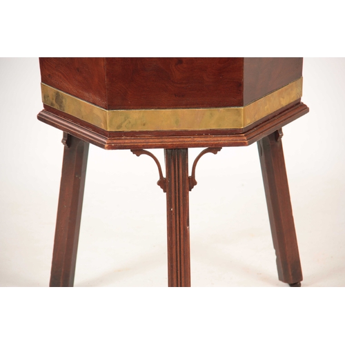 1065 - AN 18TH CENTURY FIGURED MAHOGANY BRASS BOUND HEXAGONAL SHAPED CELLARETTE ON STAND With hinged top re... 