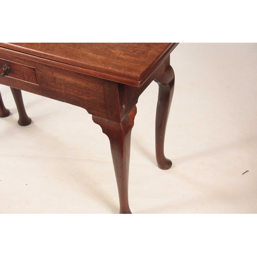 1070 - A GEORGE III MAHOGANY OVERSIZED COUNTRY HOUSE TEA TABLE with fold-over top above a central frieze dr... 