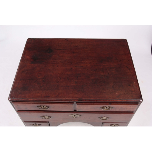 1076 - AN UNUSUAL EARLY 18TH CENTURY WALNUT CHEST the cross-grain moulded top and front edges enclosing a s... 