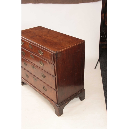 1080 - A GEORGE I WALNUT CHEST OF DRAWERS with a caddy moulded top above four graduated drawers fitted with... 