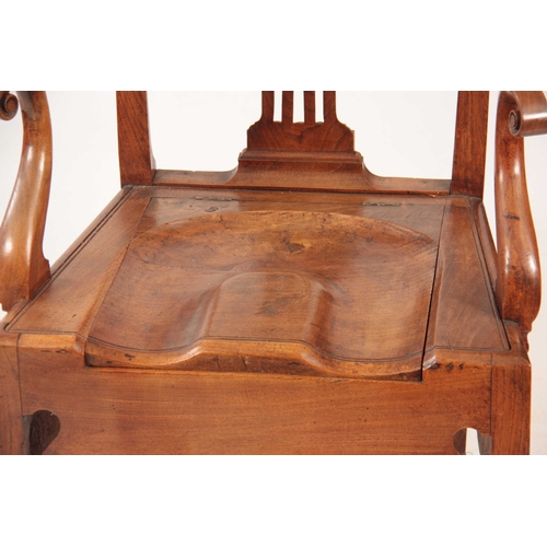 1092 - AN 18TH CENTURY COUNTRY MADE ELM CHIPPENDALE STYLE COMMODE ARMCHAIR with shaped top rail above a pie... 