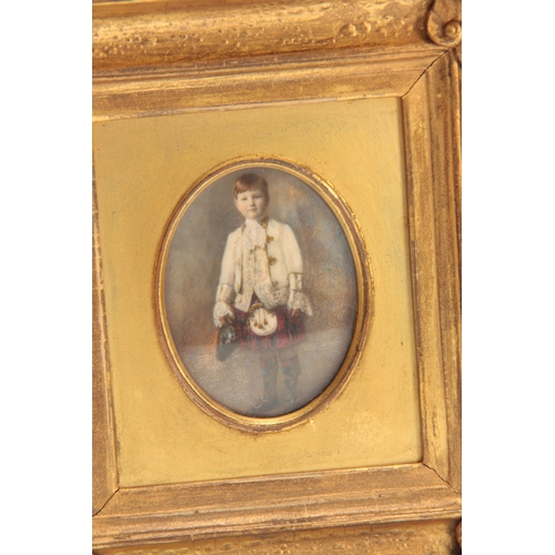 760 - A LATE 19TH CENTURY COLOURED STANDING PORTRAIT OF A BOY 7.5cm by 5.5.cm - glazed front and giltwood ... 