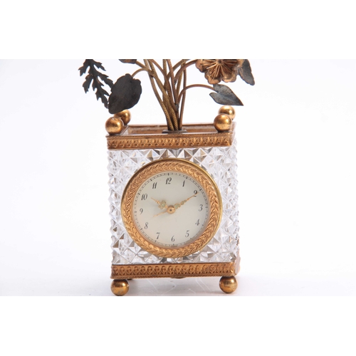 807 - A 20TH CENTURY FRENCH CRYSTAL MANTEL CLOCK fitted with a spring-driven movement and decorated with a... 