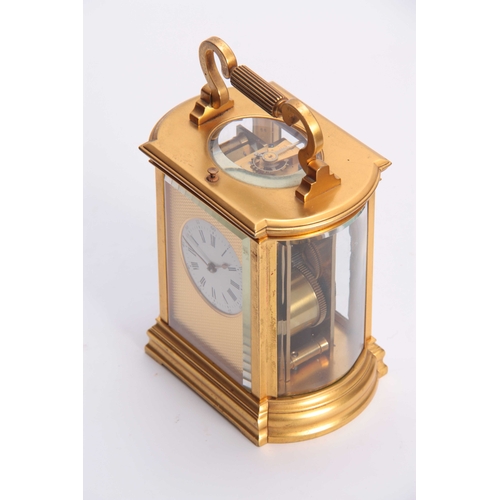 810 - A LATE 19th CENTURY FRENCH REPEATING CARRIAGE CLOCK the gilt bow sided case inset with bevelled glas... 