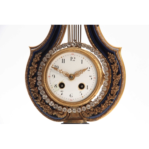 815 - A LATE 19th CENTURY FRENCH ORMOLU MOUNTED MYSTERY CLOCK the lyre-shaped cobalt blue porcelain case s... 