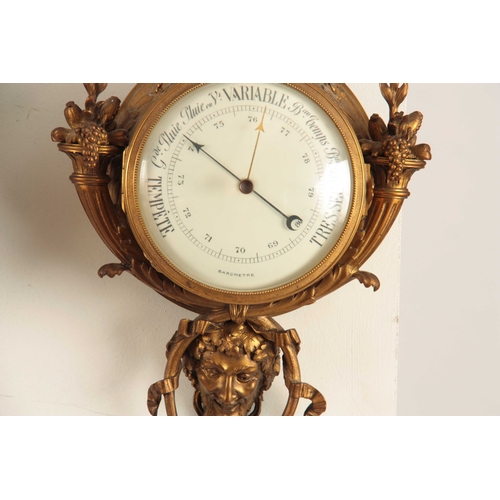 817 - A LATE 19th CENTURY FRENCH ORMOLU WALL CLOCK BAROMETER SET the clock with gilt bronze case surmounte... 