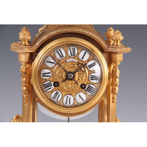 818 - DESVIGNES A LYON. A LATE 19TH CENTURY FRENCH ORMOLU MANTLE CLOCK  the gilt brass case with urn finia... 