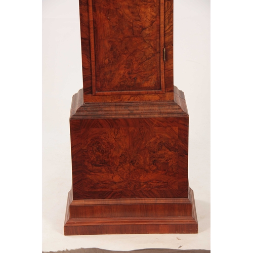 822 - JOHN MAY, LONDON A GEORGE I BURR WALNUT LONGCASE CLOCK having a caddy top above pierced sound frets ... 