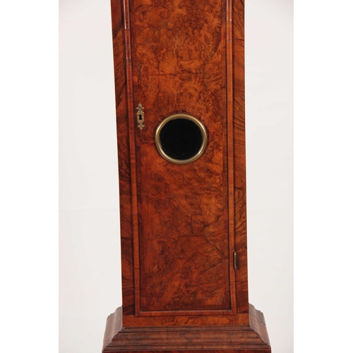 822 - JOHN MAY, LONDON A GEORGE I BURR WALNUT LONGCASE CLOCK having a caddy top above pierced sound frets ... 