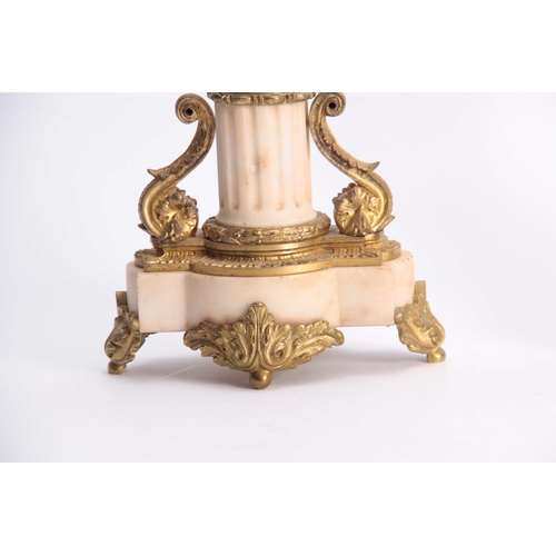 829 - A 19TH CENTURY FRENCH ALABASTER, GILT BRASS AND BRONZE MOUNTED MANTEL GARNIATURE SET the ornate cent... 