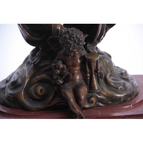 847 - A LATE 19th CENTURY FRENCH FIGURAL MANTEL CLOCK RAISED ON A ROUGE MARBLE BASE the two patinated clas... 