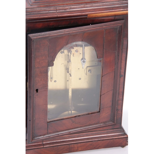 849 - RIEDER & CO, LONDON A GEORGE III FIGURED MAHOGANY BRACKET CLOCK the bell top pediment above a glazed... 