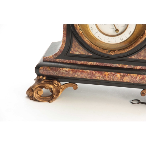 898 - A LATE 19th CENTURY FRENCH ORMOLU MOUNTED BLACK AND ROUGE MARBLE CALENDAR CLOCK surmounted by an orm... 