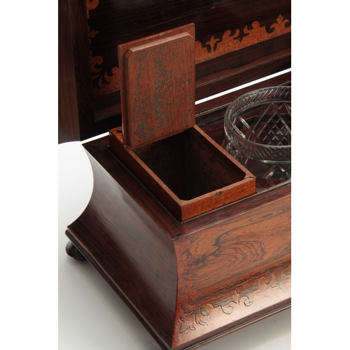 907 - A LATE REGENCY ROSEWOOD AND BIRDSEYE MAPLE CUT MARQUETRY SARCOPHAGUS TEA CADDY  the hinged lid enclo... 