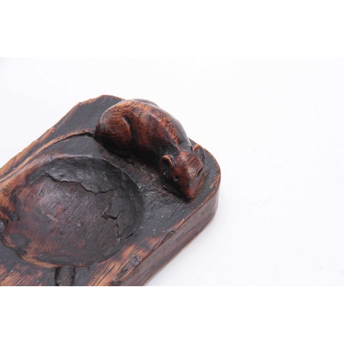 928 - AN EARLY ROBERT MOUSEMAN THOMPSON OAK ASH TRAY of clipped and rounded rectangular form with fine car... 