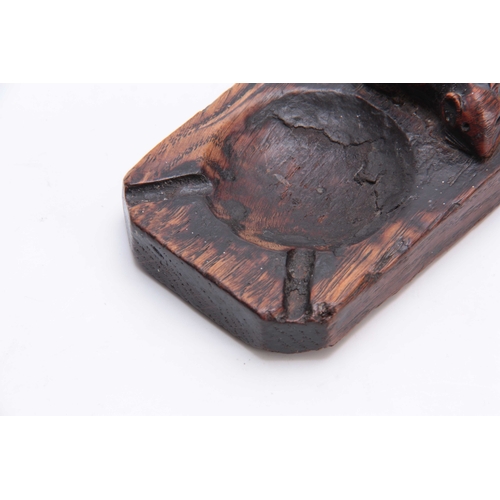 928 - AN EARLY ROBERT MOUSEMAN THOMPSON OAK ASH TRAY of clipped and rounded rectangular form with fine car... 