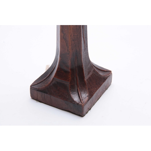 929 - AN EARLY ROBERT MOUSEMAN THOMPSON ADZED OAK TABLE LAMP OF GOOD COLOUR AND  PATINA with diamond carve... 