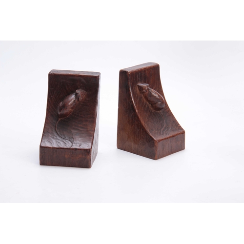 930 - A GOOD EARLY PAIR OF ROBERT MOUSEMAN THOMPSON ADZED OAK BOOKENDS OF RICH COLOUR AND PATINA each with... 