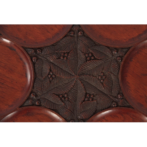 942 - A LATE 19TH CENTURY MAHOGANY SHALLOW REVOLVING TABLE DUMB WAITER the scallop-edged dished top on a c... 