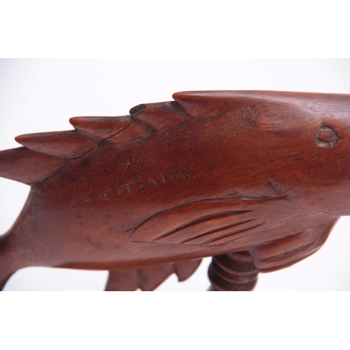 945 - A PAIR OF 19TH CENTURY HARDWOOD PITCAIRN SOUTH PACIFIC CARVED BOOKENDS DEPICTING FISH both carved Pi... 