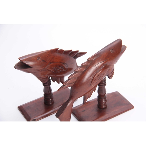 945 - A PAIR OF 19TH CENTURY HARDWOOD PITCAIRN SOUTH PACIFIC CARVED BOOKENDS DEPICTING FISH both carved Pi... 