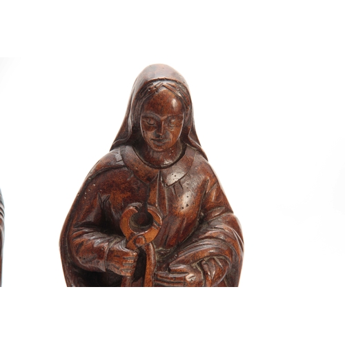 946 - THREE 18TH CENTURY STYLE CARVED RELIGIOUS FIGURES 34cm high and smaller.