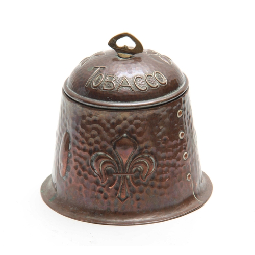 958 - AN ARTS AND CRAFTS HAMMERED COPPER TOBACCO JAR AND COVER with floral decoration and Fleur-de-lis - s... 