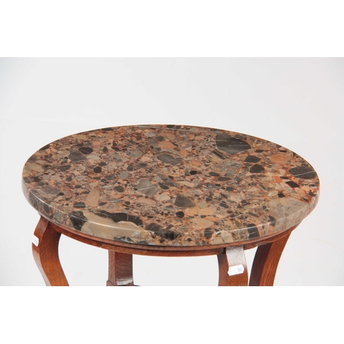 964 - AN ARTS AND CRAFTS OCCASIONAL TABLE having a circular marble top supported on square tapering oak le... 