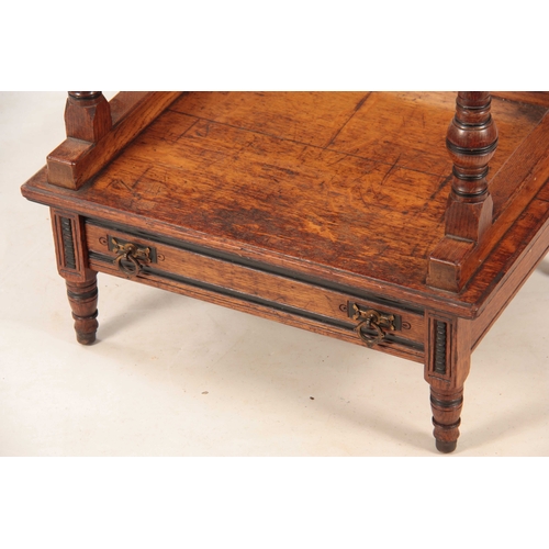 968 - LAMB, MANCHESTER A LATE 19TH CENTURY ARTS AND CRAFTS OAK THREE TIER WHATNOT with ebonised turned col... 