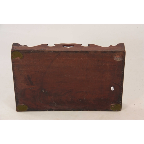 974 - A GEORGE III FIGURED MAHOGANY RECTANGULAR TRAY with shaped gallery and cutout side handles 58cm wide... 