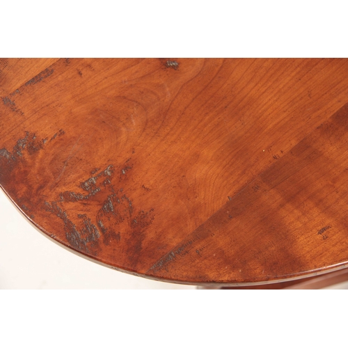 977 - AN 18TH CENTURY CHERRY WOOD FOLDING COACHING TABLE with oval plank top above a ring turned hinged ba... 