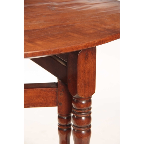 977 - AN 18TH CENTURY CHERRY WOOD FOLDING COACHING TABLE with oval plank top above a ring turned hinged ba... 