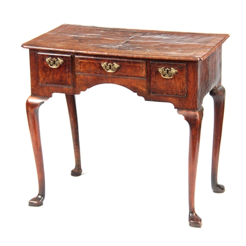 984 - AN ELEGANT GEORGE II WALNUT LOWBOY HAVING GOOD COLOUR AND PATINA with quarter veneered top and inset... 