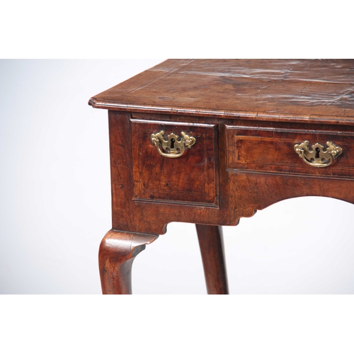 984 - AN ELEGANT GEORGE II WALNUT LOWBOY HAVING GOOD COLOUR AND PATINA with quarter veneered top and inset... 