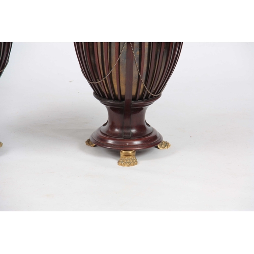 990 - A PAIR OF LATE 19TH CENTURY ADAM STYLE MAHOGANY JARDINIERE STANDS of circular form with shaped spind... 