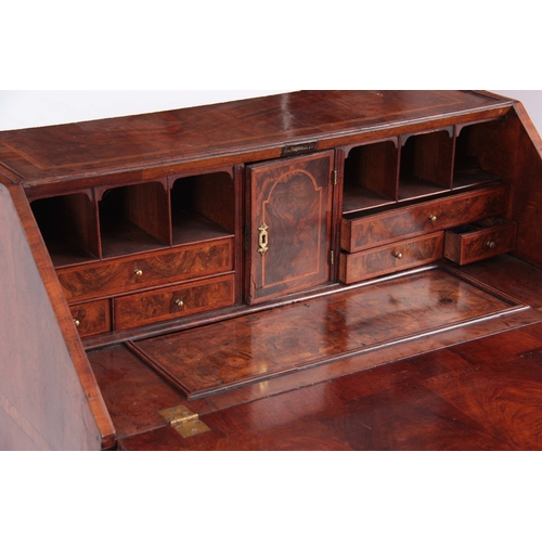 992 - A GOOD WILLIAM AND MARY HERRING-BANDED AND BURR WALNUT BUREAU having angled hinged fall revealing a ... 