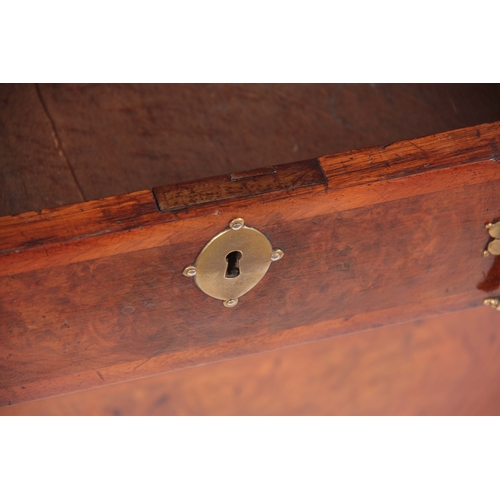 992 - A GOOD WILLIAM AND MARY HERRING-BANDED AND BURR WALNUT BUREAU having angled hinged fall revealing a ... 