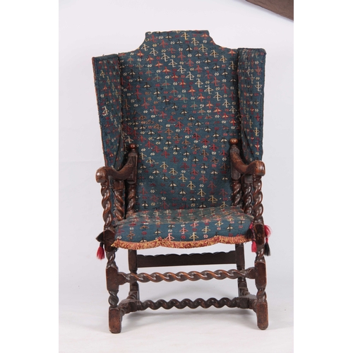 996 - A HIGHLY UNUSUALLY WALNUT CHARLES II RECLINING WING ARMCHAIR with hinged upholstered back and seat o... 