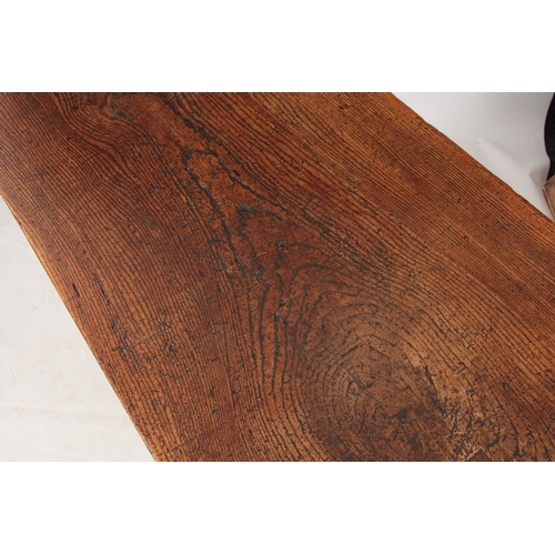 997 - A GOOD LATE 17TH CENTURY OAK REFECTORY / FARMHOUSE TABLE with one-piece plank top, above a plain fri... 