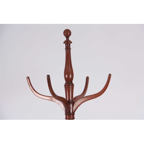 998 - A LATE GEORGIAN THREE TIER MAHOGANY COAT AND HAT STAND with curved hooks and tapering ring turned sl... 